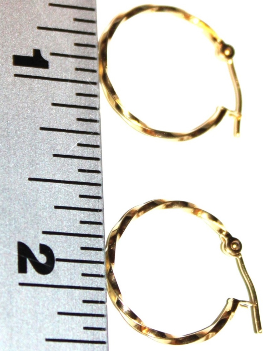 Solid 14K yellow gold marked 14K flawless twist hoop Earrings